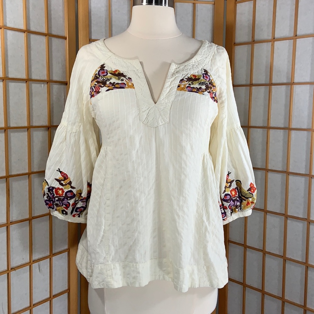 Anthropologie puff sleeve embroidered blouse.